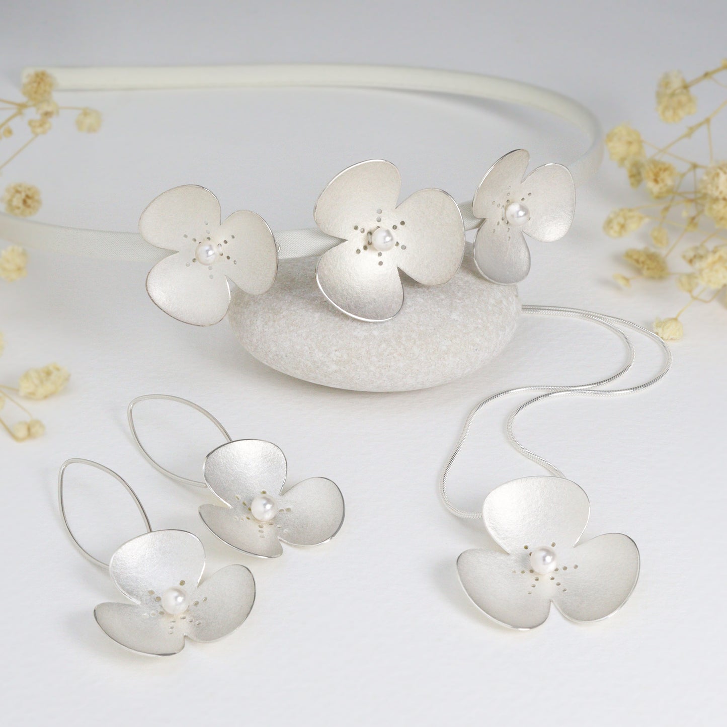Three Silver and Pearl Poppies on satin headband, which instantly become a jewellery set
