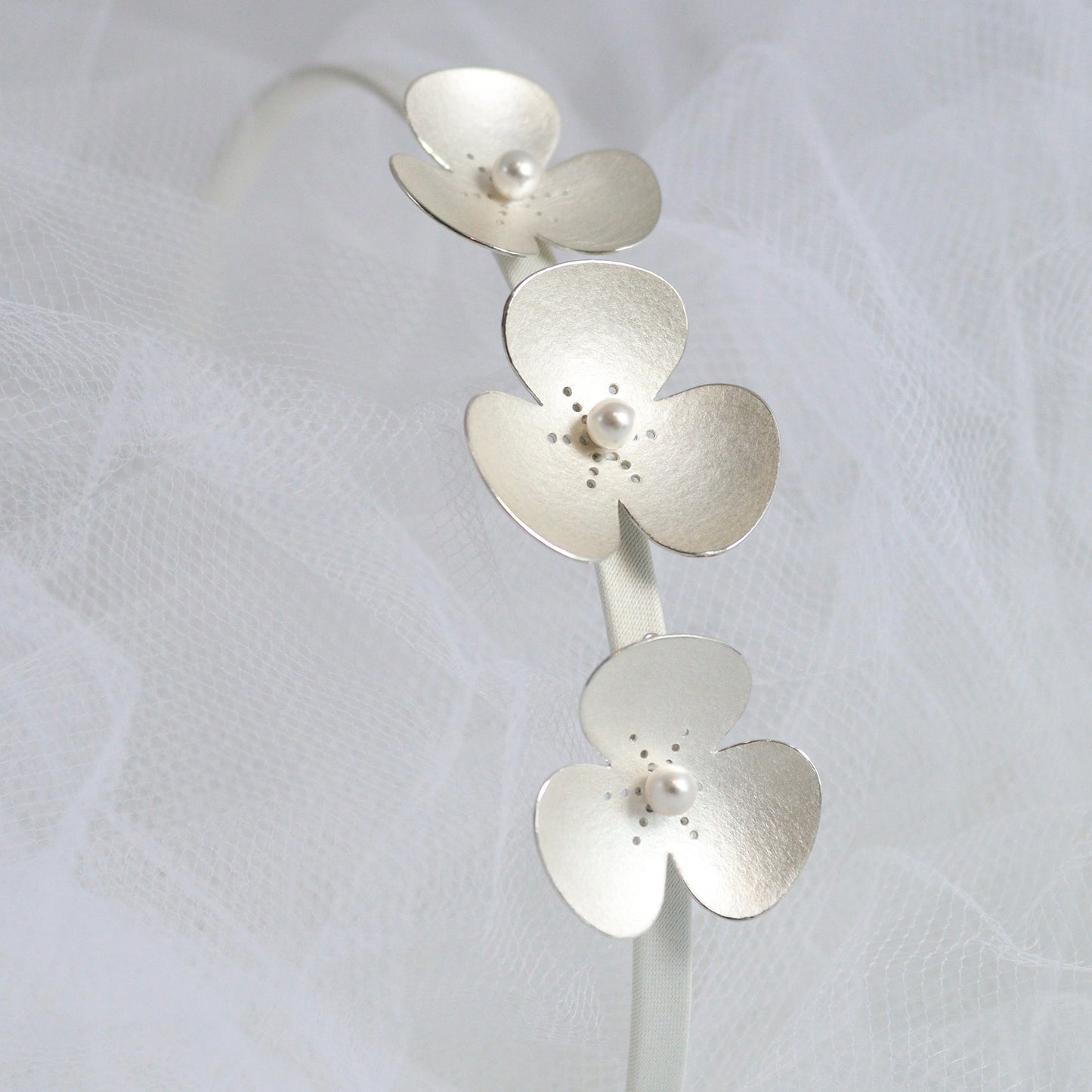 Three Silver and Pearl Poppies on satin headband, which instantly become a jewellery set