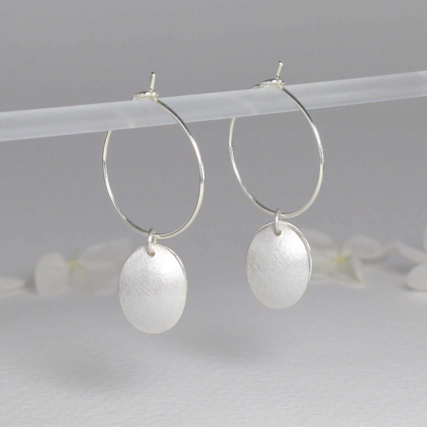 Silver double petal hoop earrings