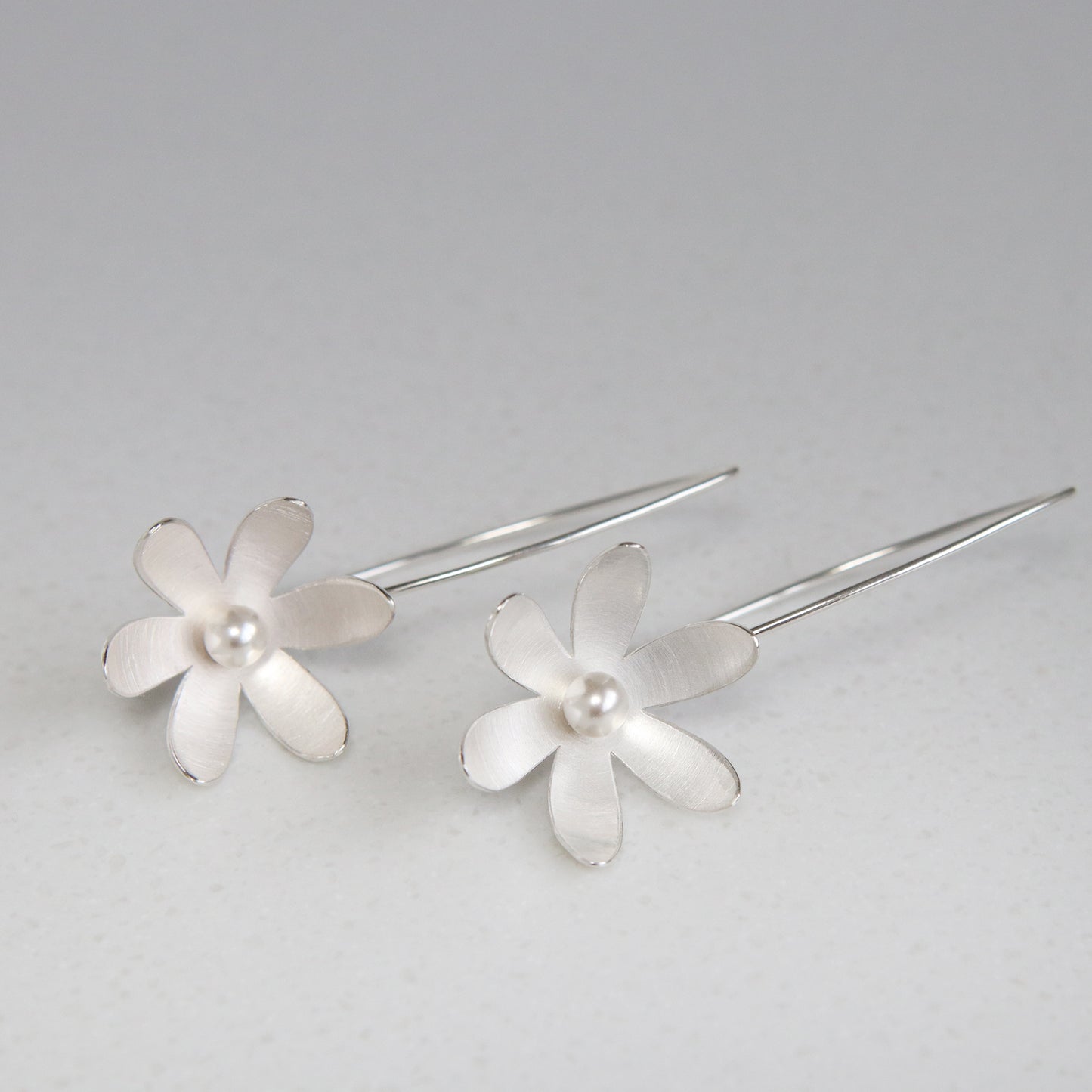 Silver and Pearl Daisy long earrings