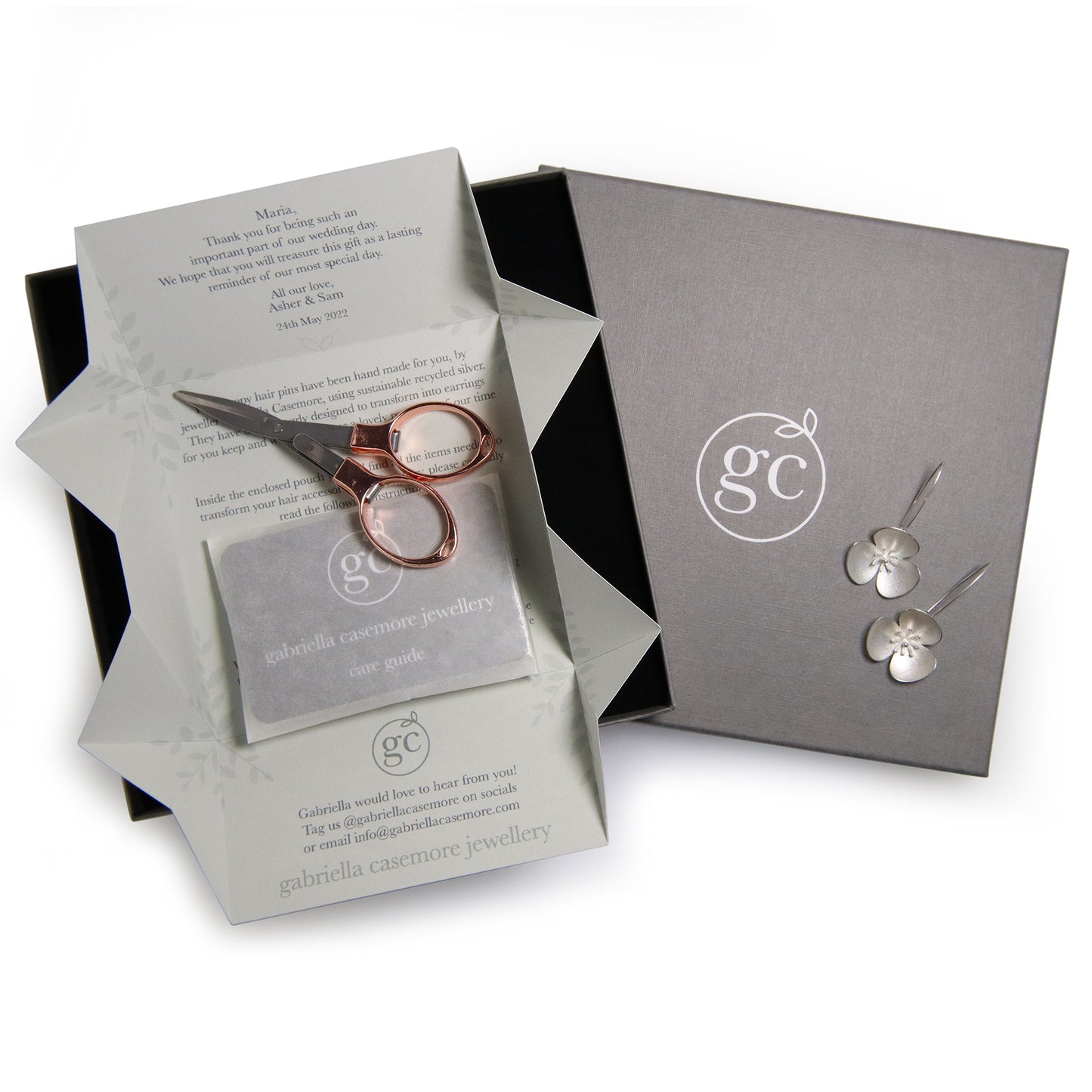 Two Silver Poppy hairpins, which instantly convert to a pair of earrings