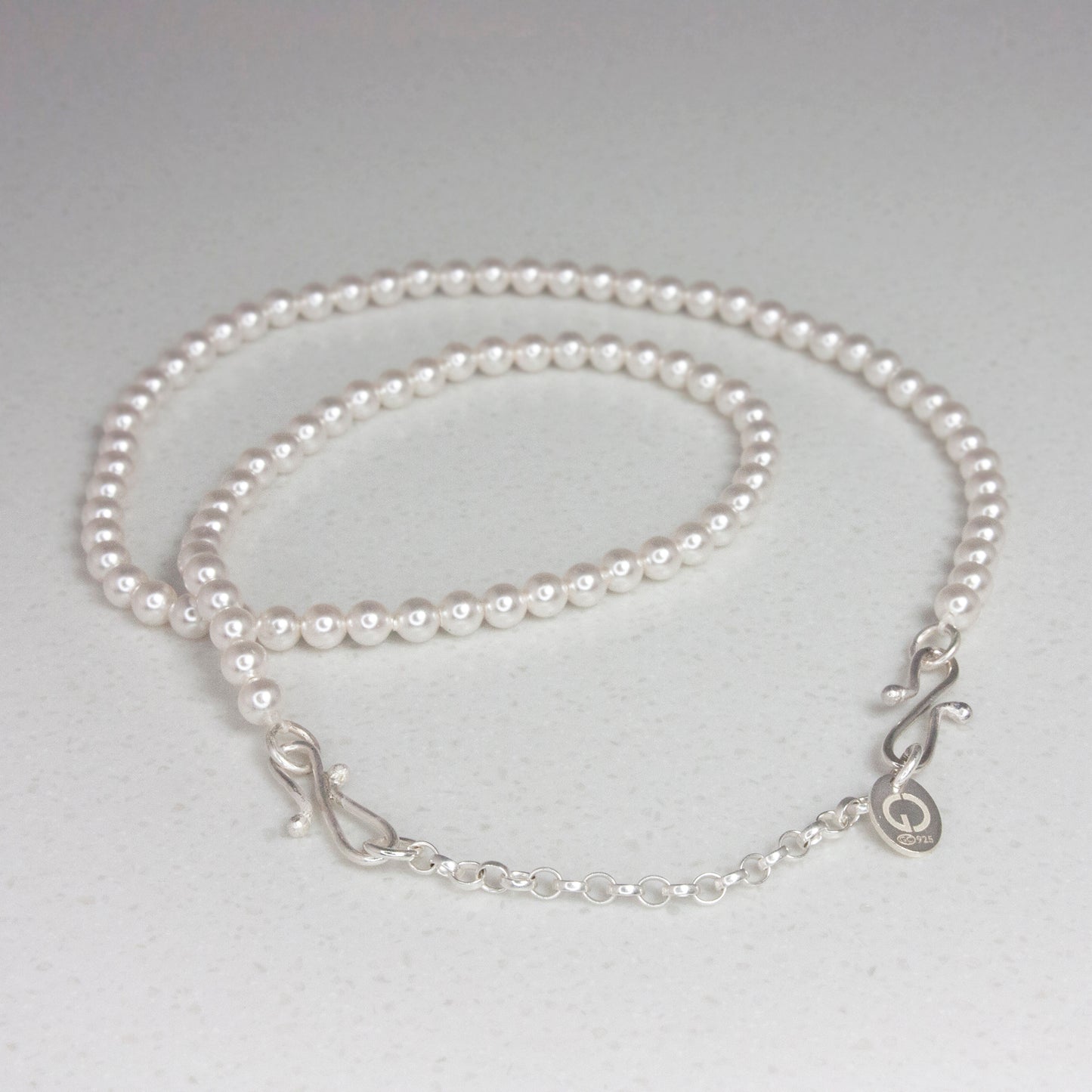 Three Silver and Pearl Poppy hairpins, which instantly convert to a set of jewellery
