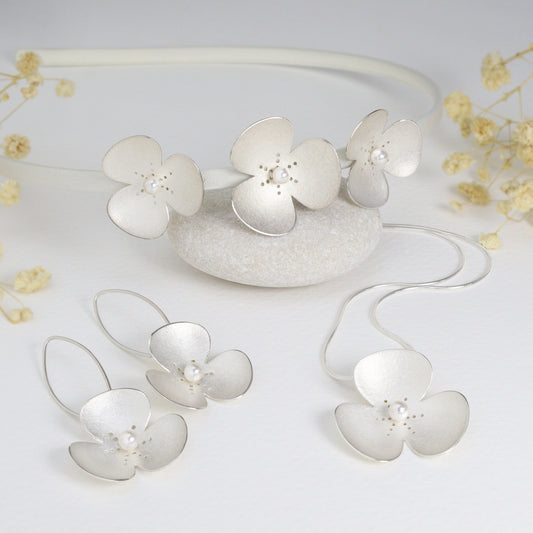 Three Silver and Pearl Poppies on satin headband, which instantly become a jewellery set