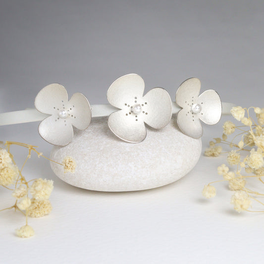 Three Silver and Pearl Poppies on satin headband, which instantly become a jewellery set