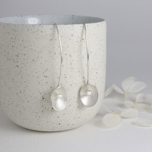 Long silver and pearl large seed earrings