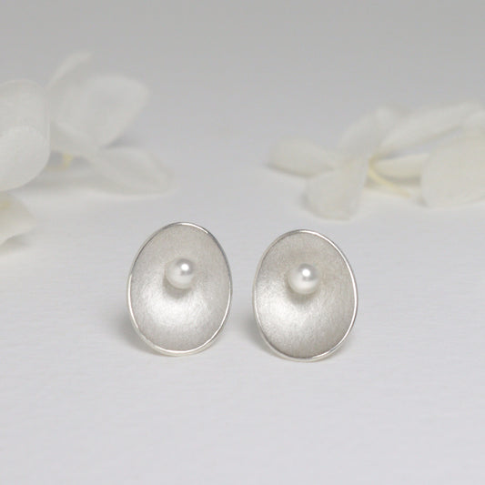 Large silver and pearl seed stud earrings