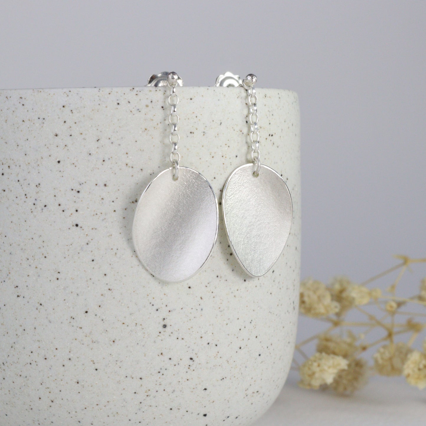 Large curled petal on chain stud earrings