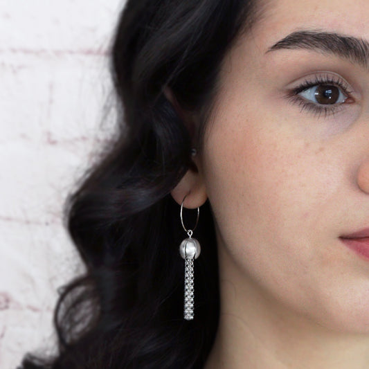 Silver crocus with tassels hoop earrings