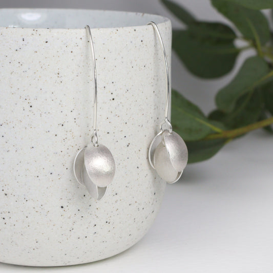 Silver small four petal long earrings