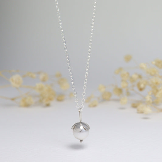 SALE small blossom with crystal pearl on trace chain
