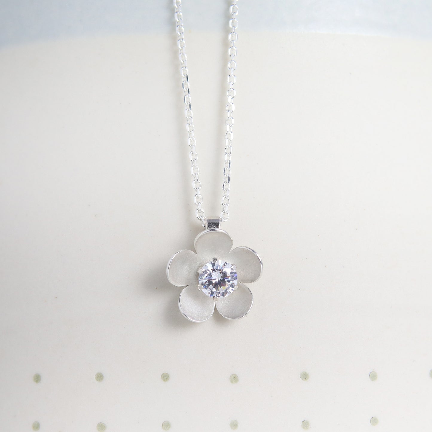 Silver blossom flower necklace with choice of birthstone
