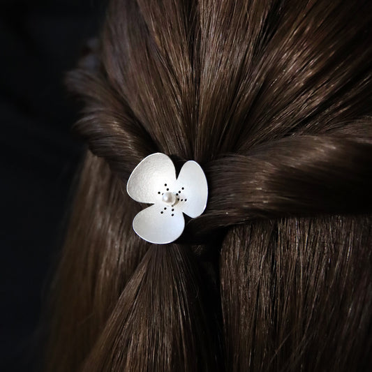 Single Silver and Pearl Poppy hairpin, which becomes a pendant