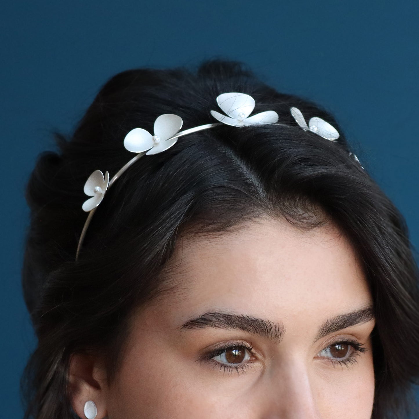 Silver Poppy headband, which becomes a set of jewellery