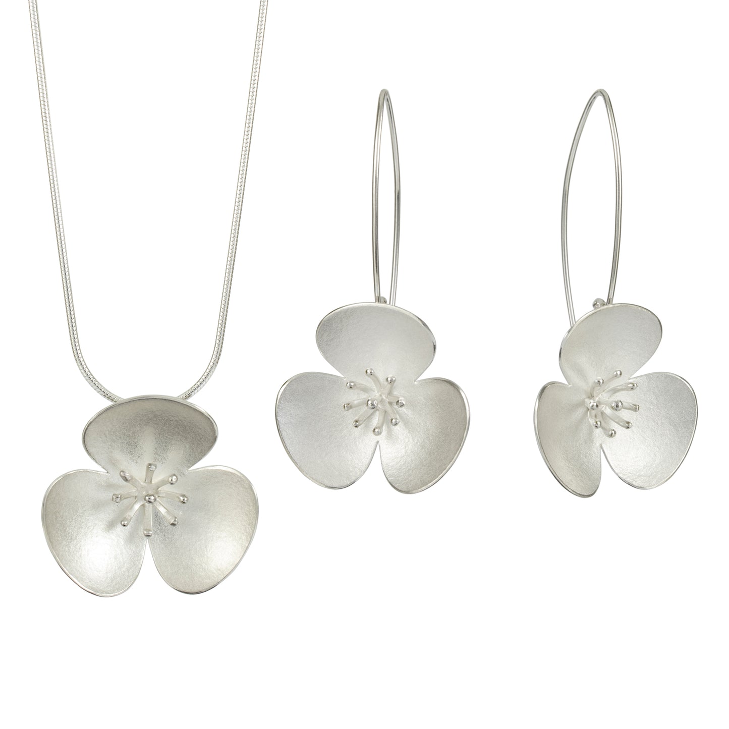 Three Silver Poppy hairpins, which instantly convert to a set of jewellery