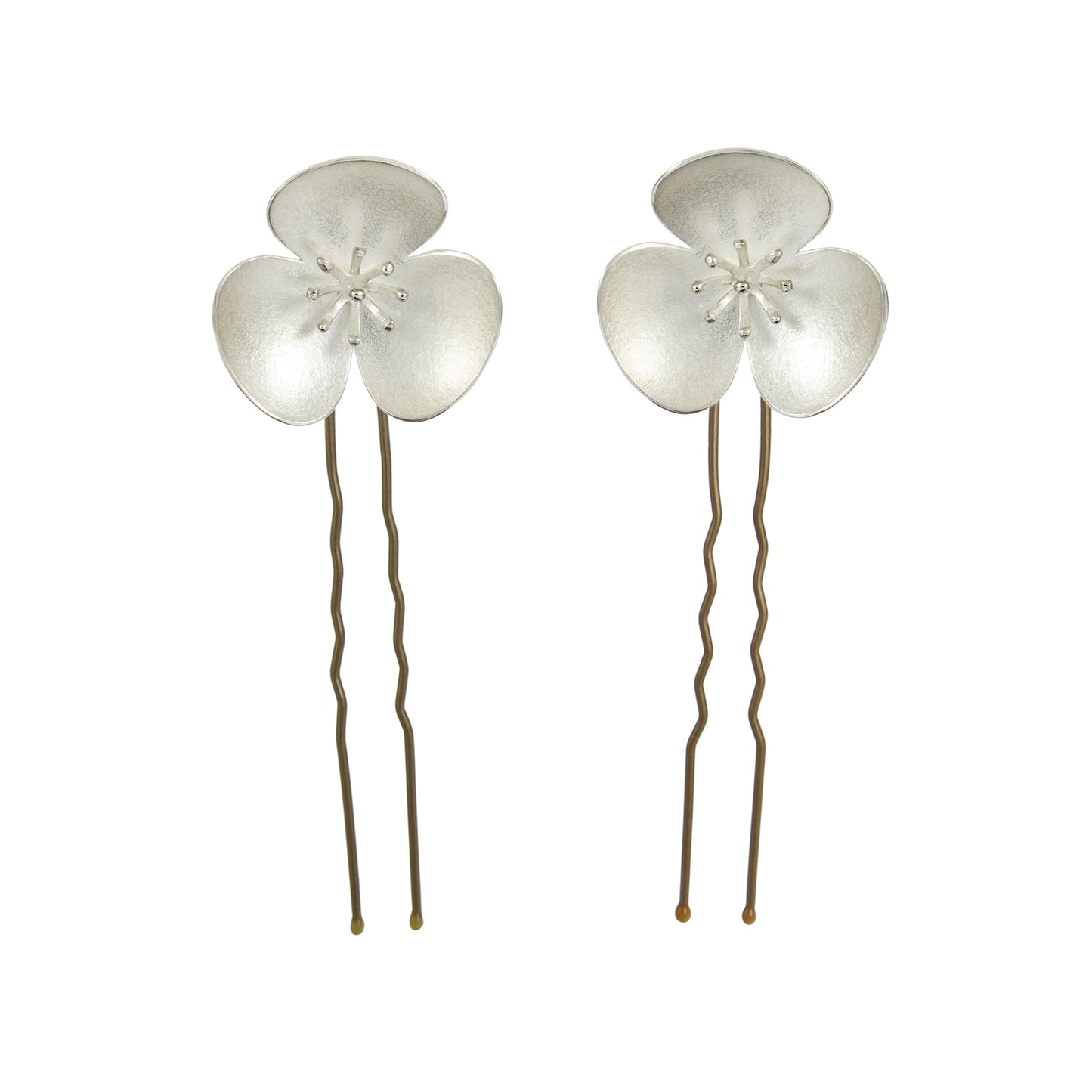 Two Silver Poppy hairpins, which instantly convert to a pair of earrings