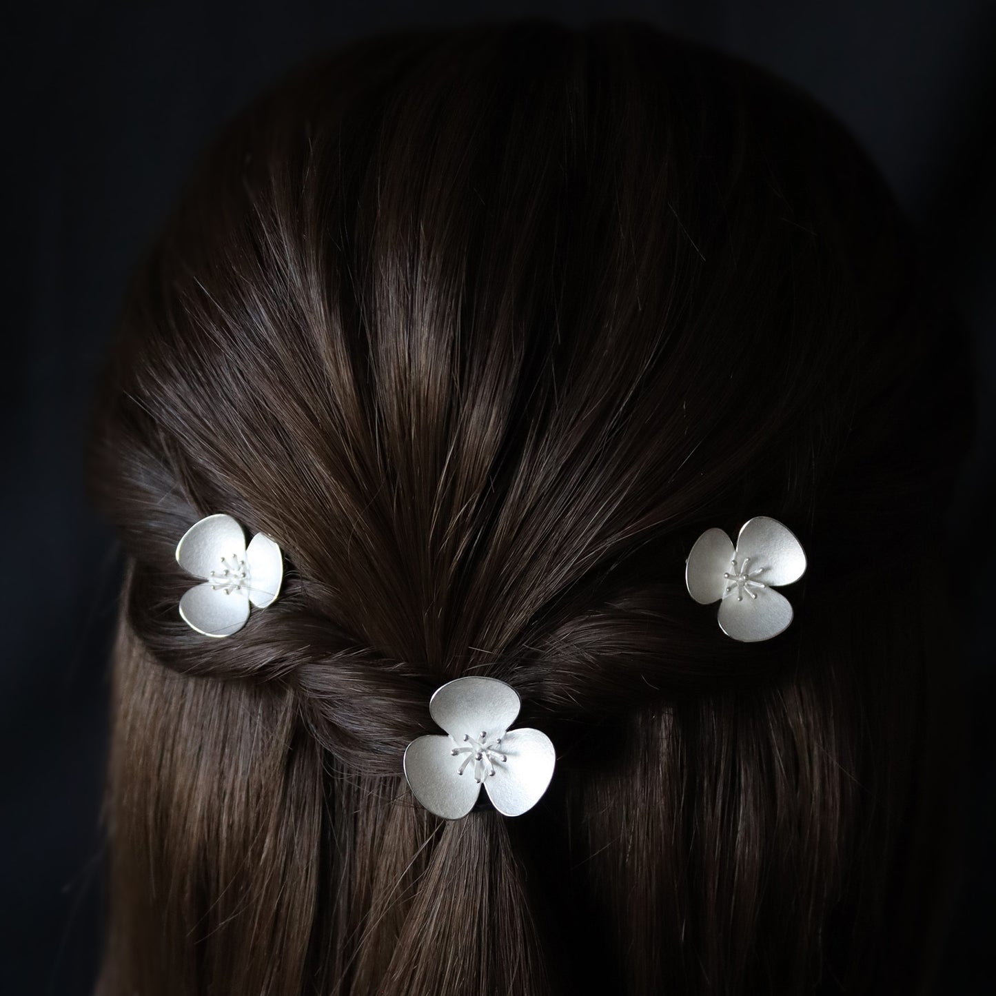 Three Silver Poppy hairpins, which instantly convert to a set of jewellery