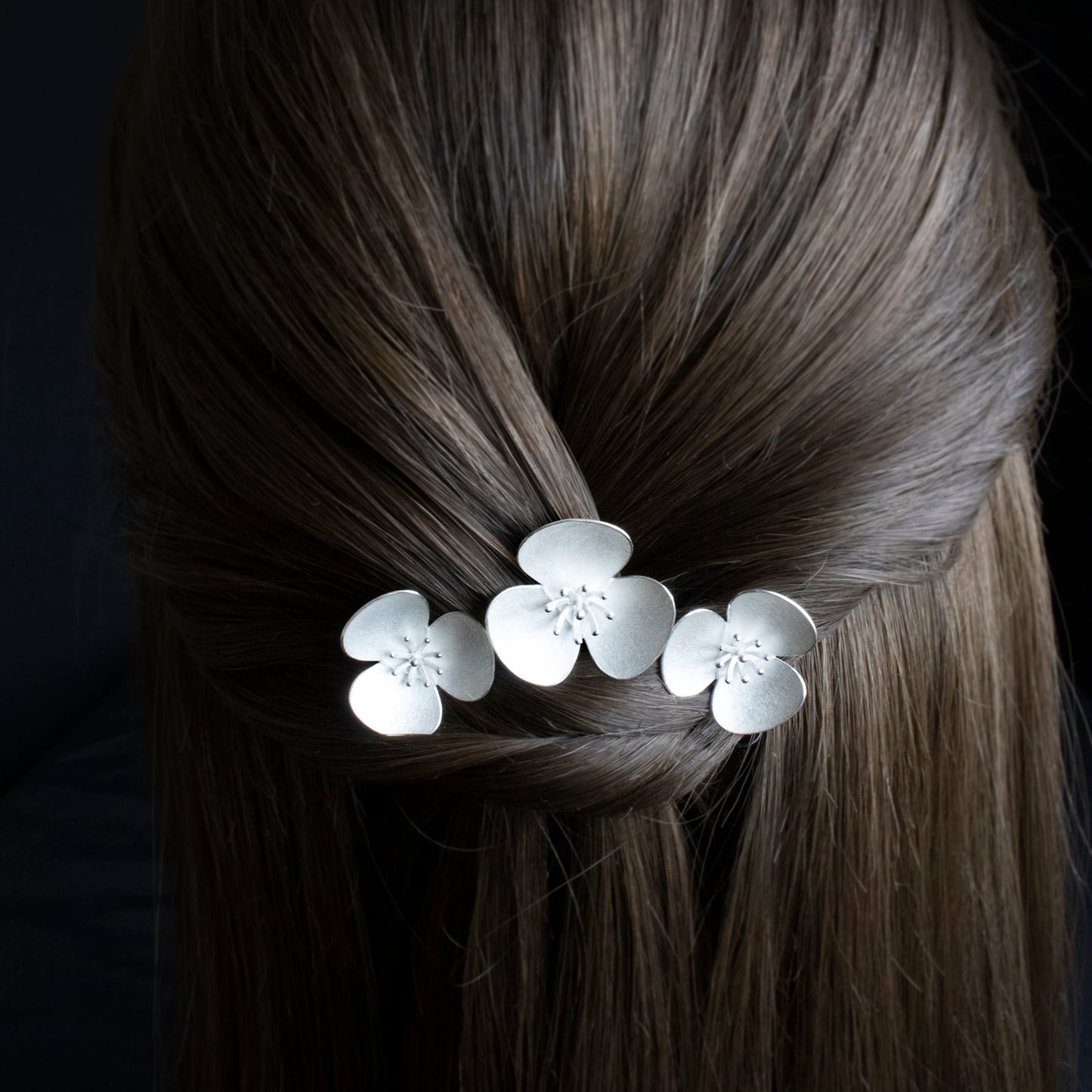 Three Silver Poppy hairpins, which instantly convert to a set of jewellery