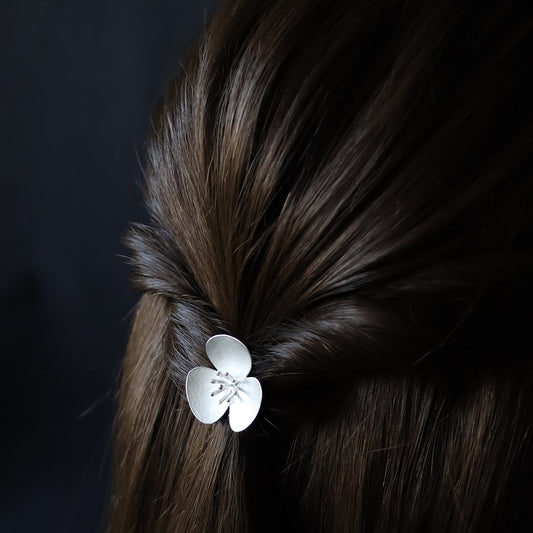 Single Silver Poppy hairpin, which instantly converts in to a pendant