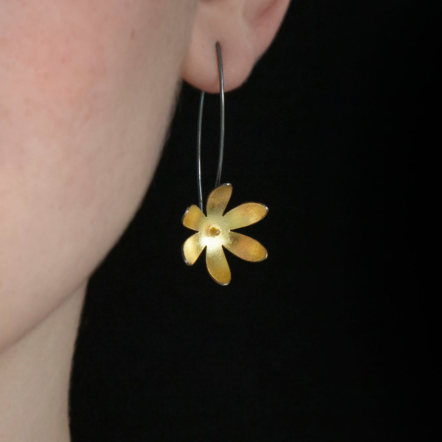 Gold and oxidised silver long flower earrings