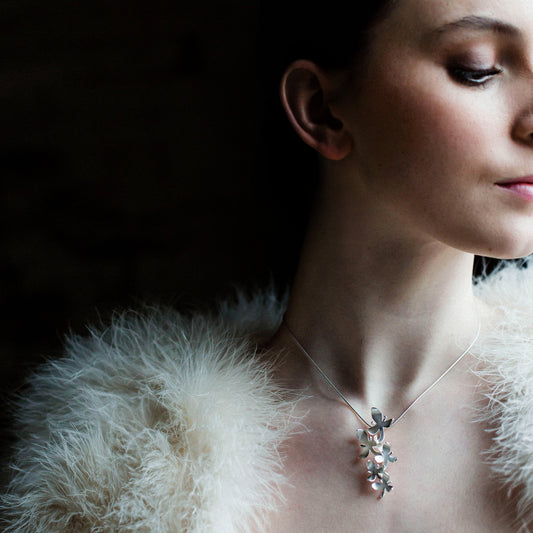 Small Silver Orchid on Bridal Satin covered Headband, becomes a pendant